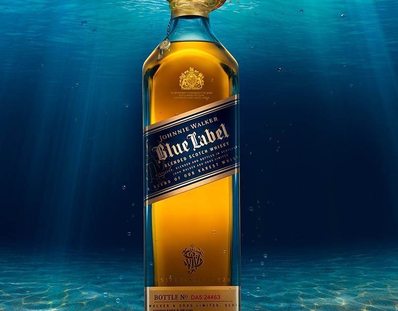 Johnny walker blue label. Johnnie Walker Blue Label GB, 40%. Johnny Walker Blue Label logo. Блю лейбл Выдержка лет. Виски красно синяя этикетка.